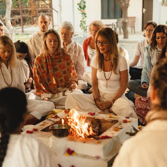 Students gathered around a sacred fire ceremony